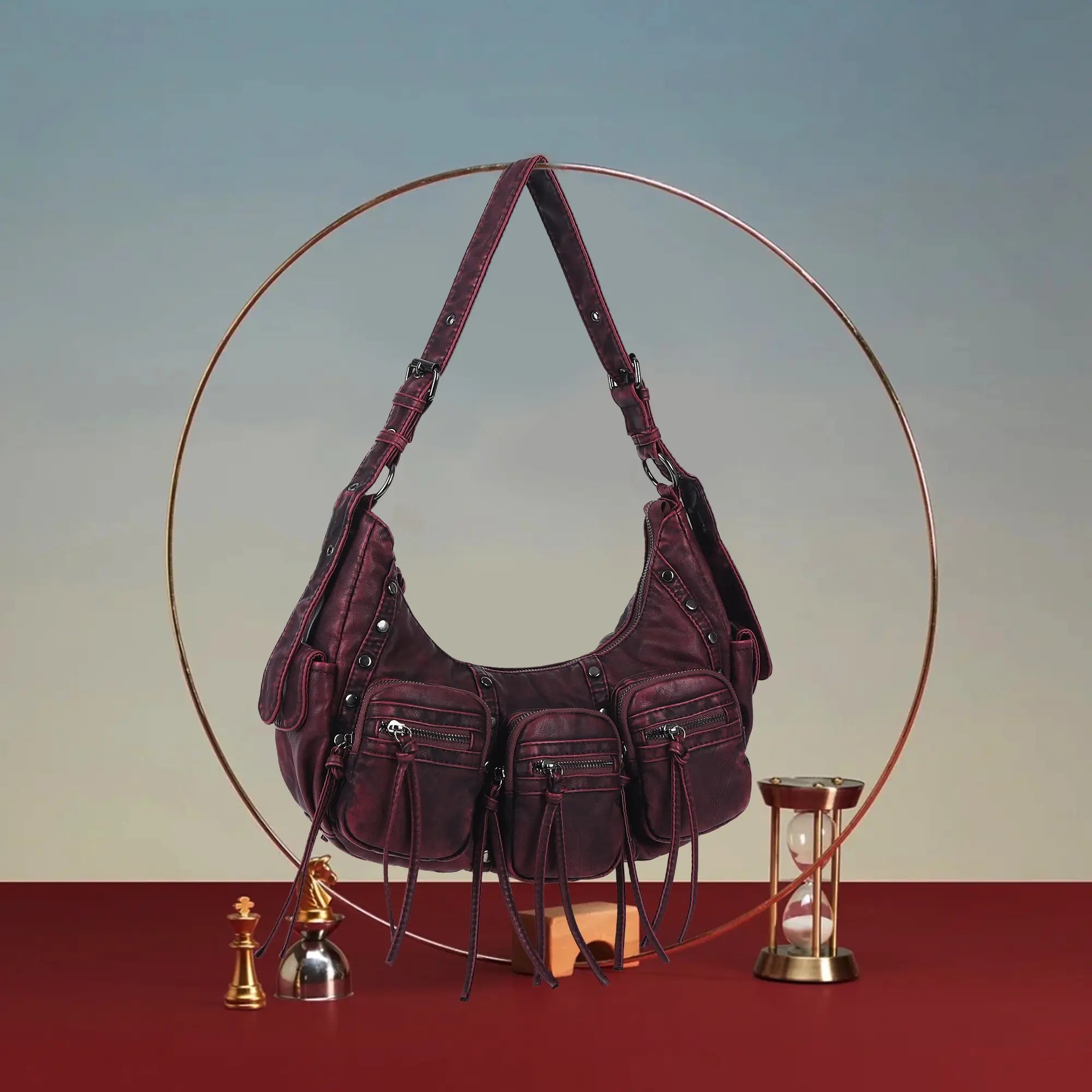 Multi-Pocket Crescent Shoulder Bag with Tassel Zipper Details