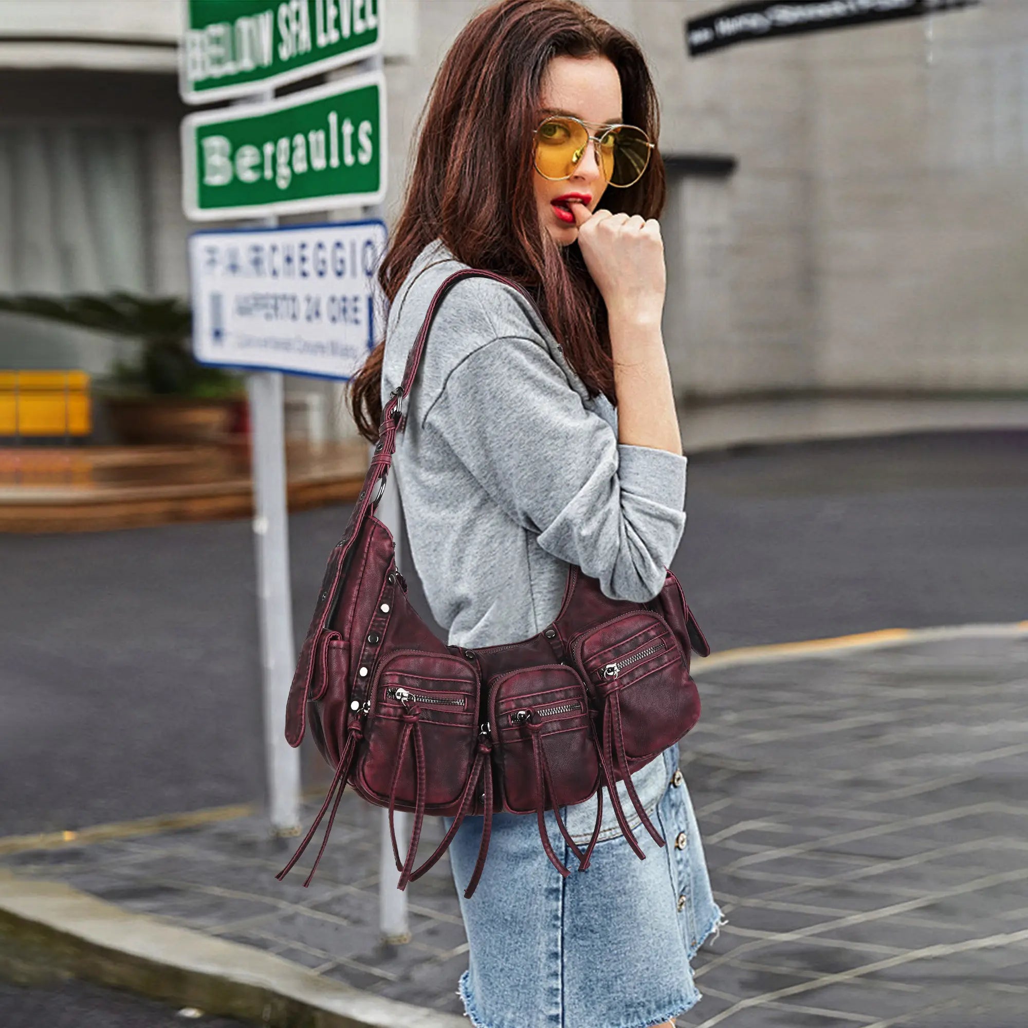Multi-Pocket Crescent Shoulder Bag with Tassel Zipper Details