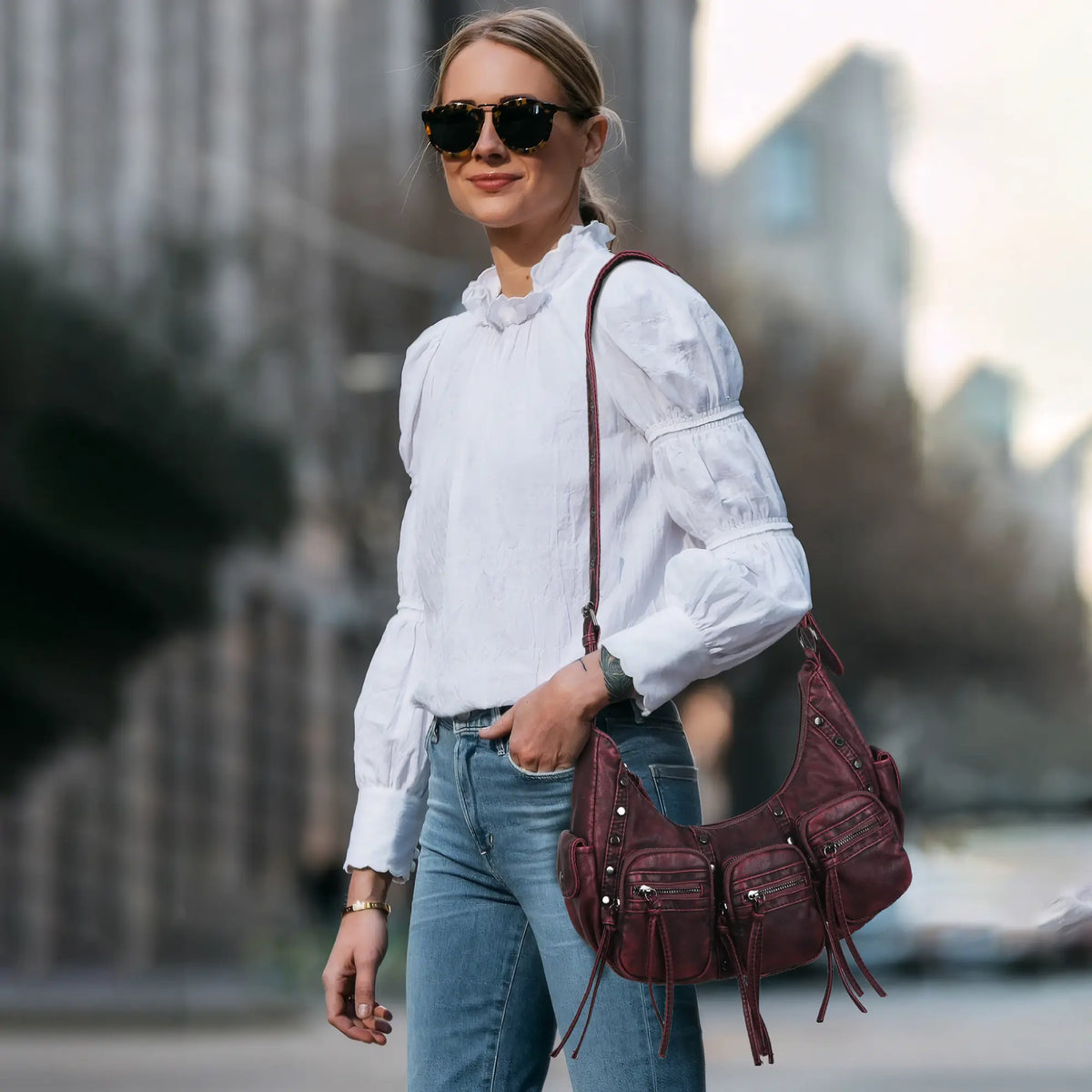 Multi-Pocket Crescent Shoulder Bag with Tassel Zipper Details