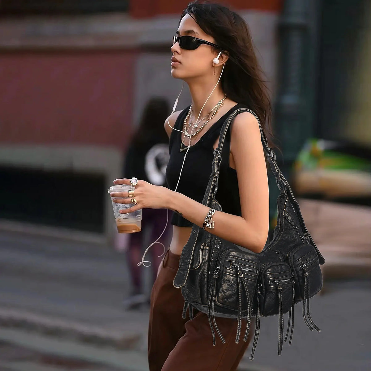 Multi-Pocket Crescent Shoulder Bag with Tassel Zipper Details