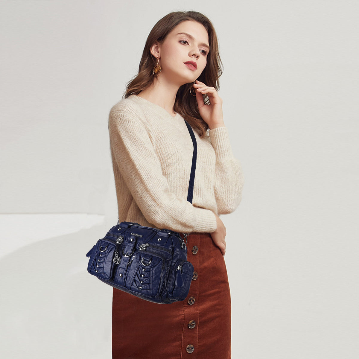 Studded Ring-Detail Multi-Pocket Shoulder Bag